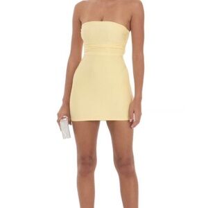 Lucy in the Sky dress.  Size XXS Yrllow with butterfly detail in back.